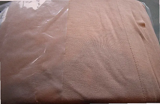 West Elm Tencel Modal knit full sheet set light terracotta photo shoot sample